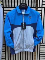 Chandal Trapstar azul y gris